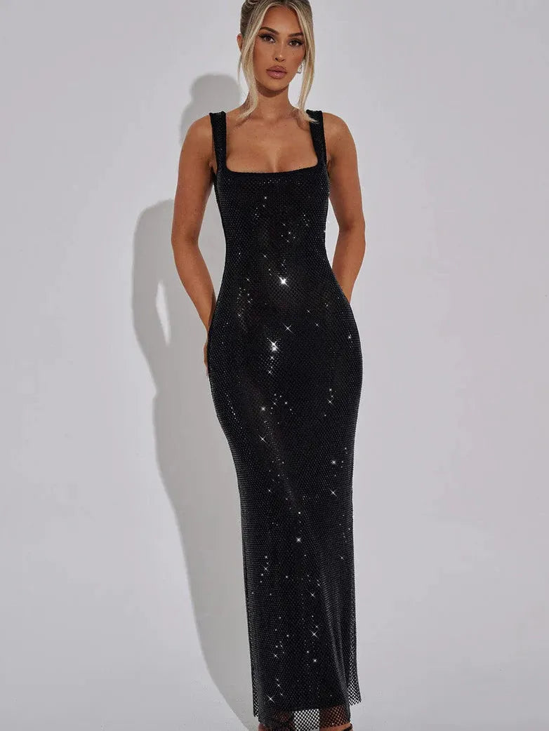 Black rhinestone-embellished maxi dress with scoop neckline and wide straps, form-fitting silhouette, backless and floor-length.