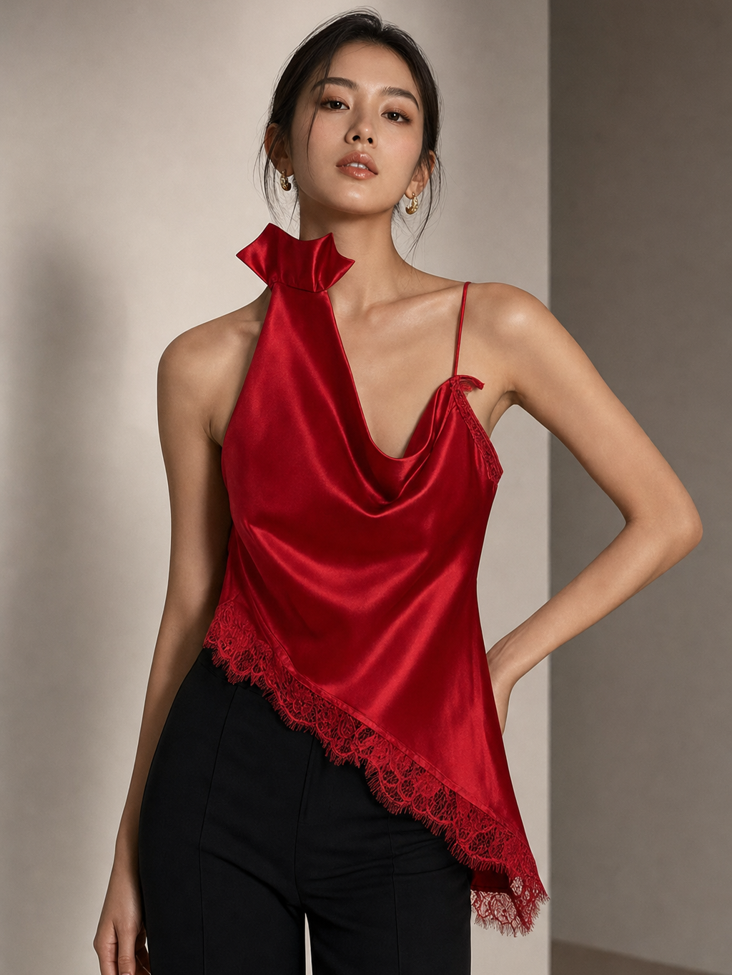 Asymmetrical lace trim satin halter top in red with draped neckline and lace hem