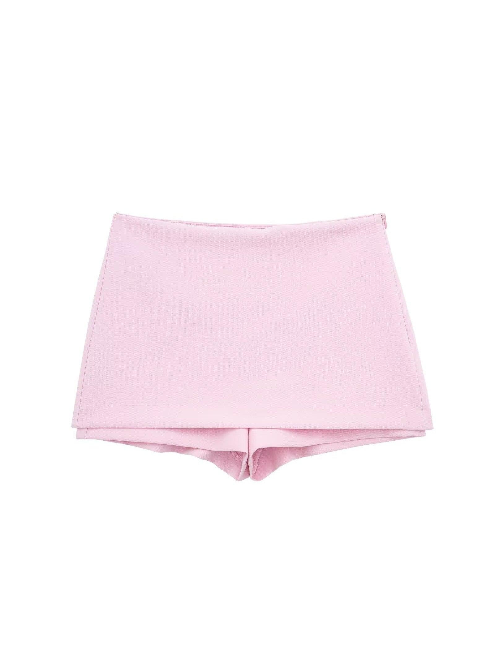 Soft pink structured skort with a layered front panel and shorts peeking underneath.