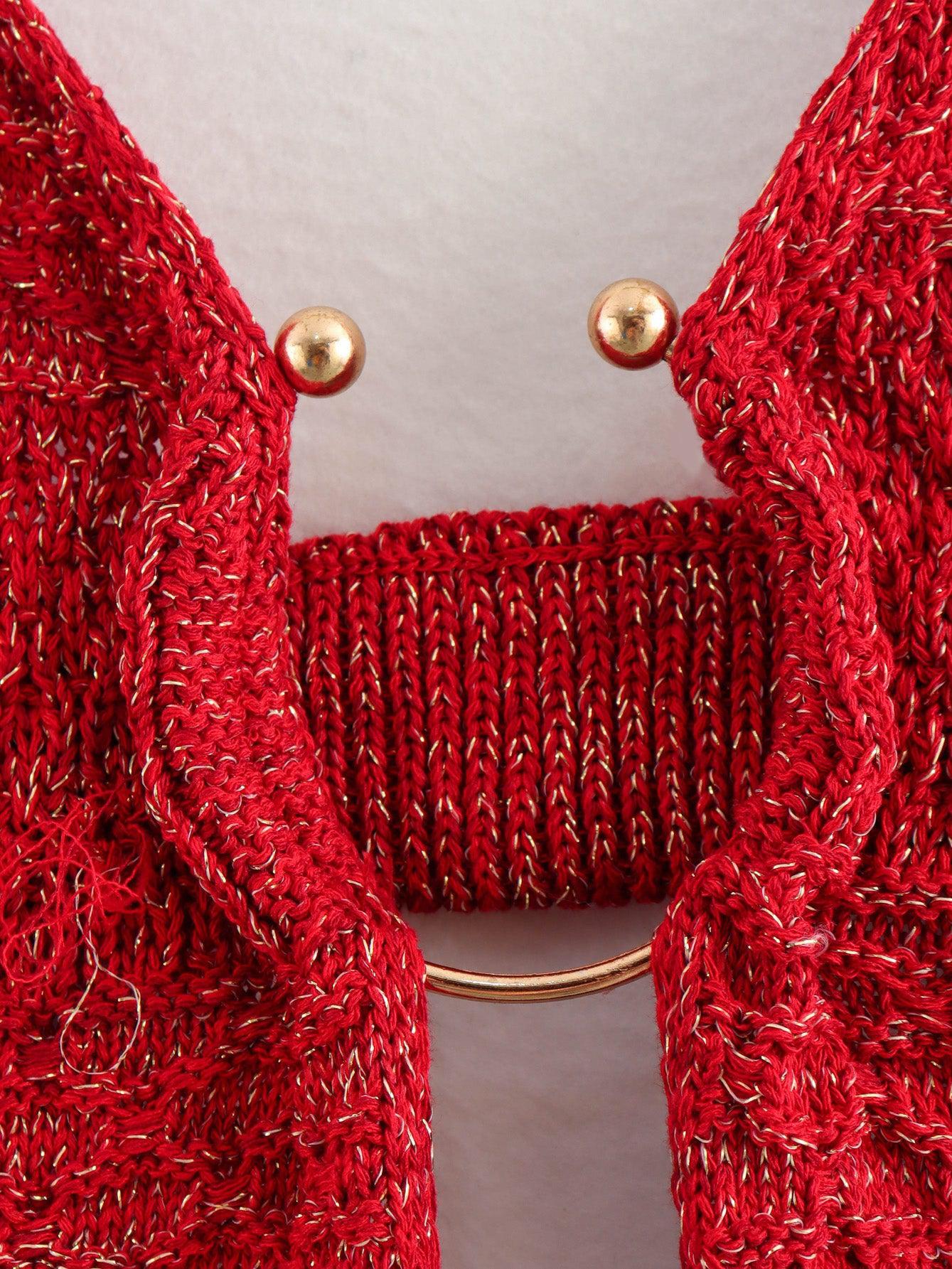 Red knitted dress with gold metallic threads; spaghetti straps with gold ball-end tips and a gold ring connector.