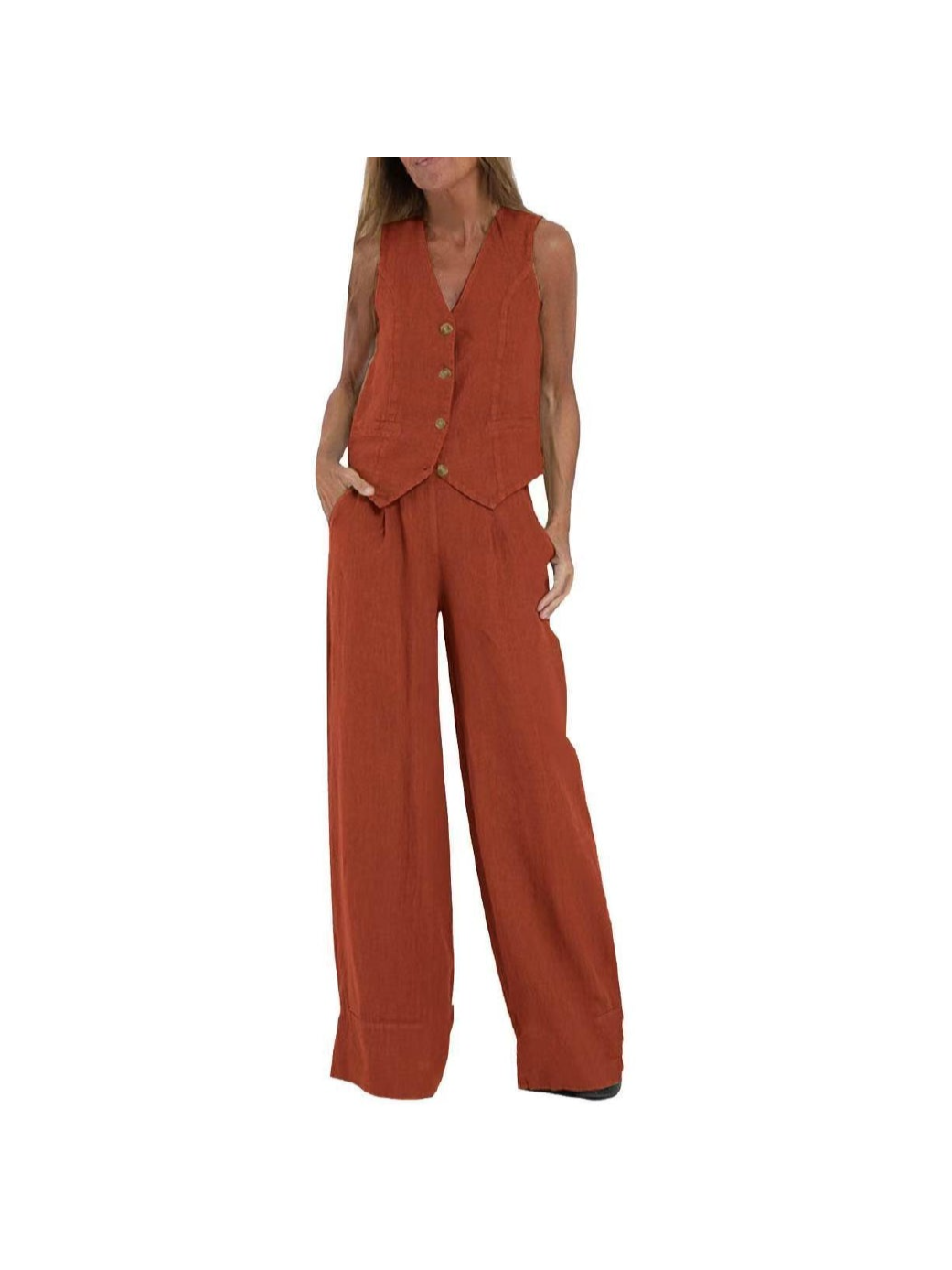 Rust-orange sleeveless waistcoat with gold-tone buttons and matching wide-leg pants coord set on a model.