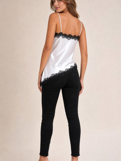 Serene Glow Lace Camisole Top in white satin with black lace trim along neckline and hem; back view on model.