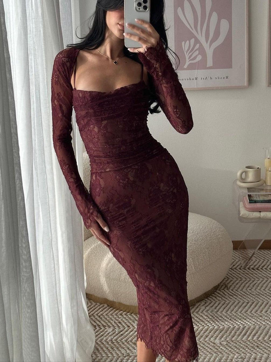 Woman wearing burgundy mesh lace midi dress with long sleeves and spaghetti straps, form-fitting floral lace silhouette.