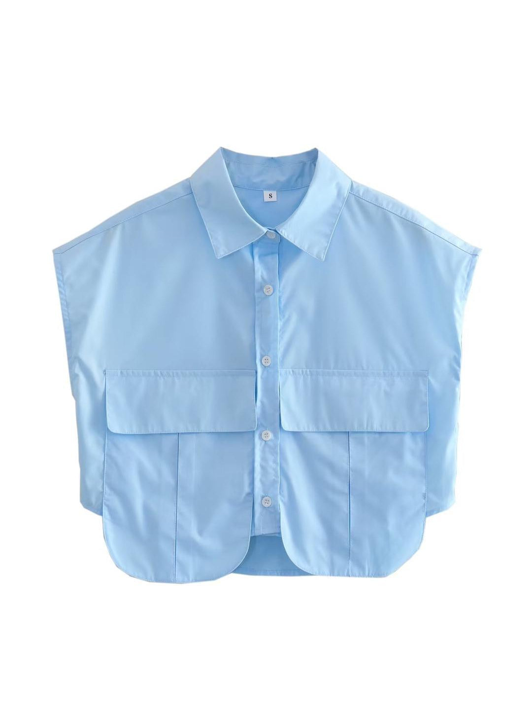 Light blue cotton crop shirt top with a classic collar, two large front pockets with flaps, and a button-down front.