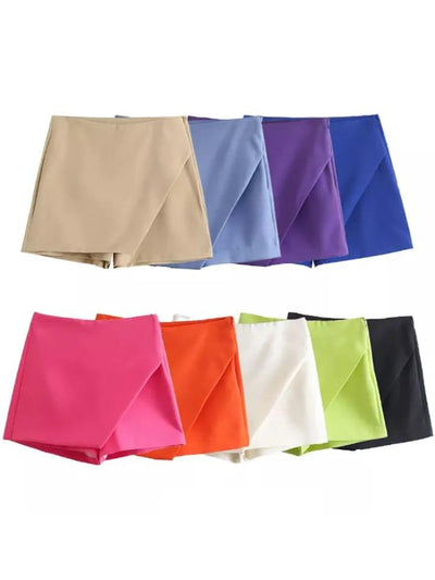Two rows of high-waist plain skorts in colors: beige, light blue, purple, cobalt, hot pink, orange, white, lime, black.