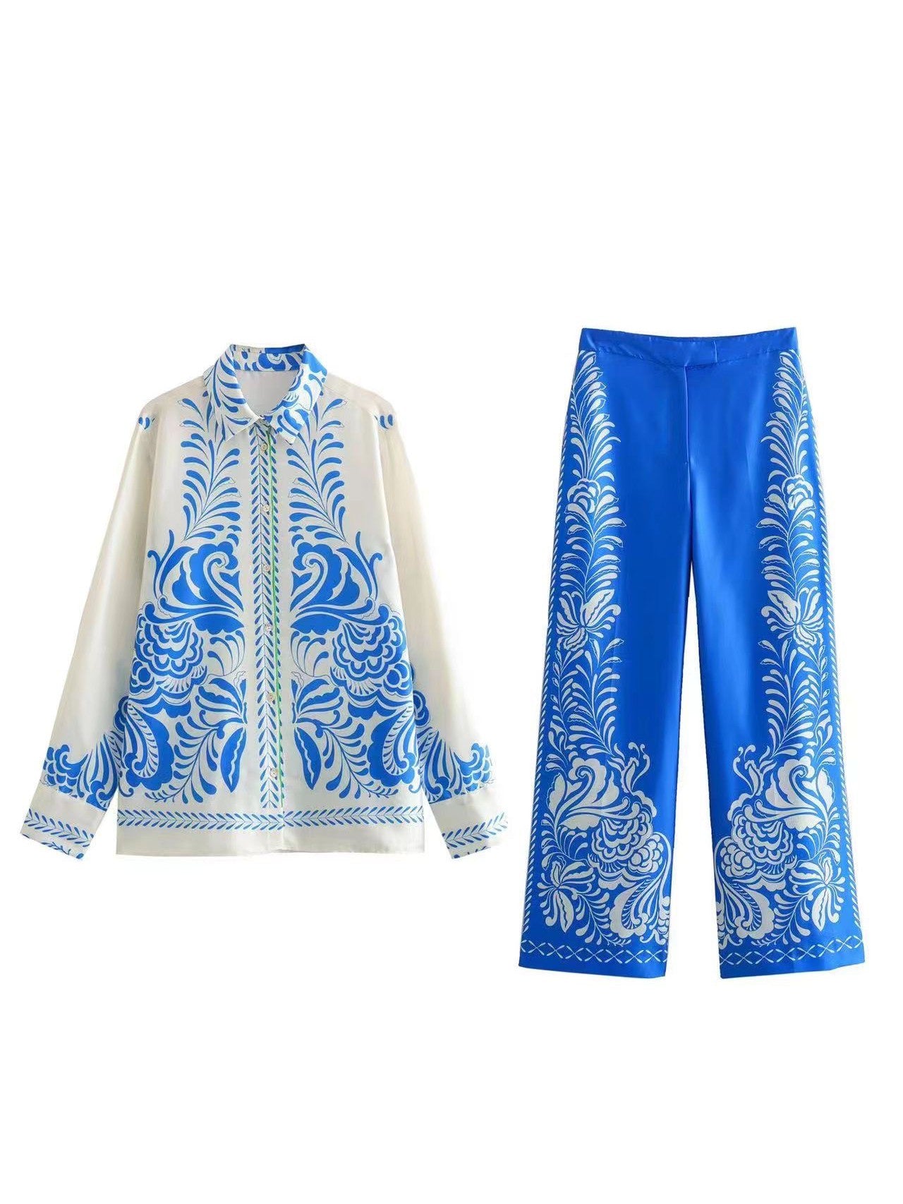 White button-down shirt with blue porcelain floral print and cobalt blue wide-leg pants with white botanical accents.