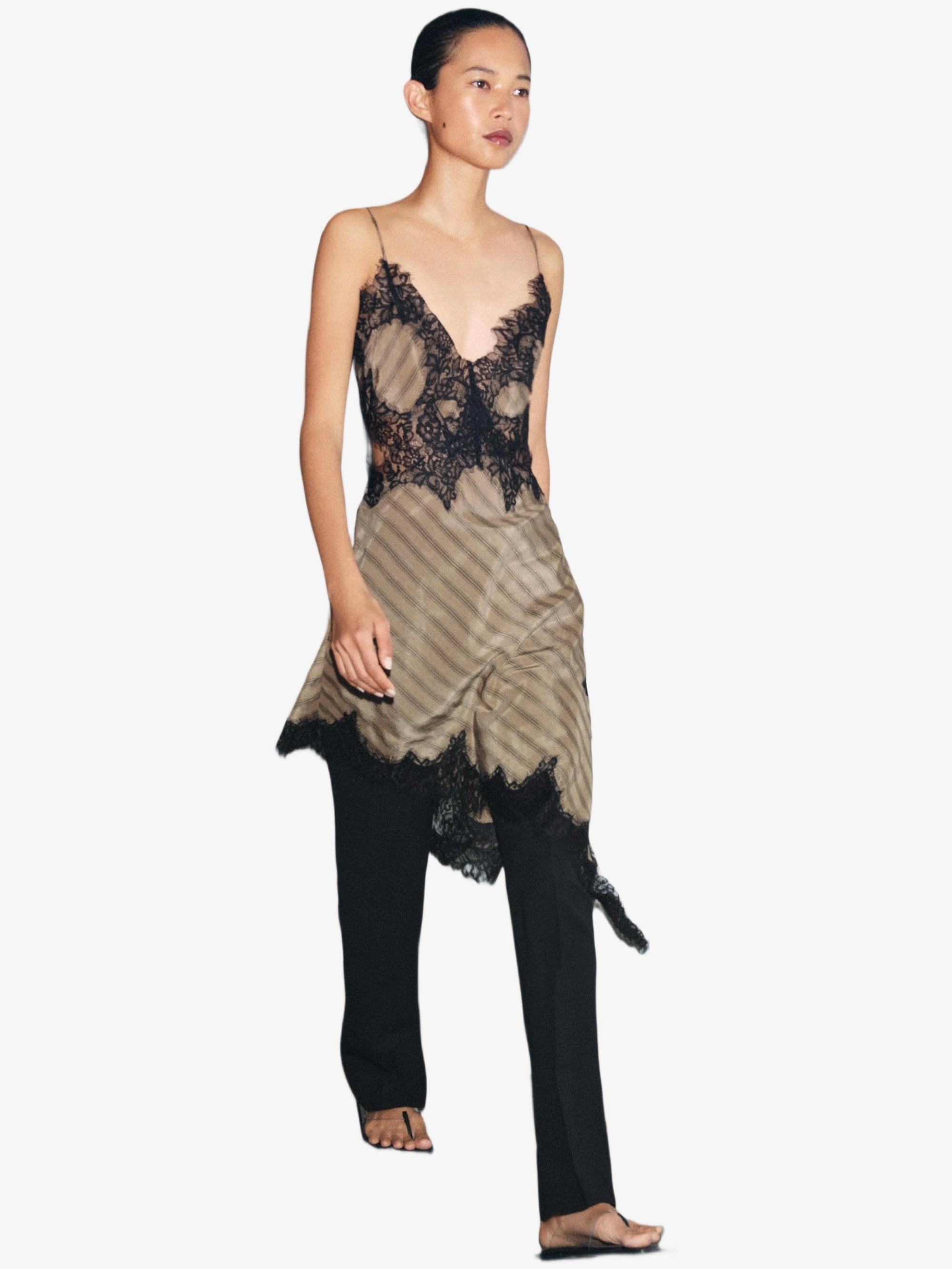 Noir Lace Trim Asymmetric Slip Dress by EXCLUSIVES; black lace over nude lining with an asymmetric hem.