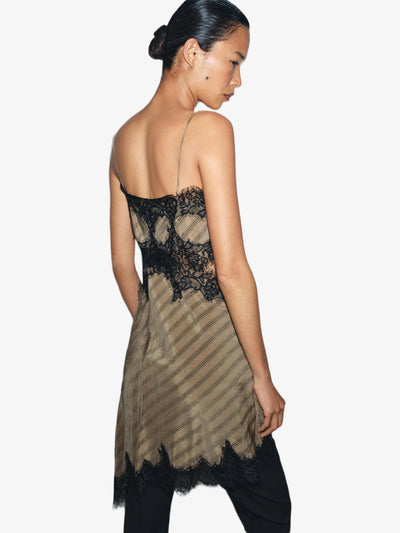 EXCLUSIVES Noir Lace Trim Asymmetric Slip Dress beige slip with black lace trim, spaghetti straps, back view