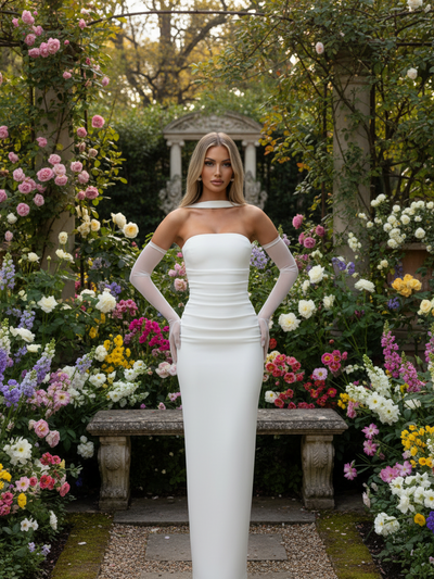 Strapless Sleeves Ruched Tube Maxi Dress with Scarf in white worn by model in a garden setting
