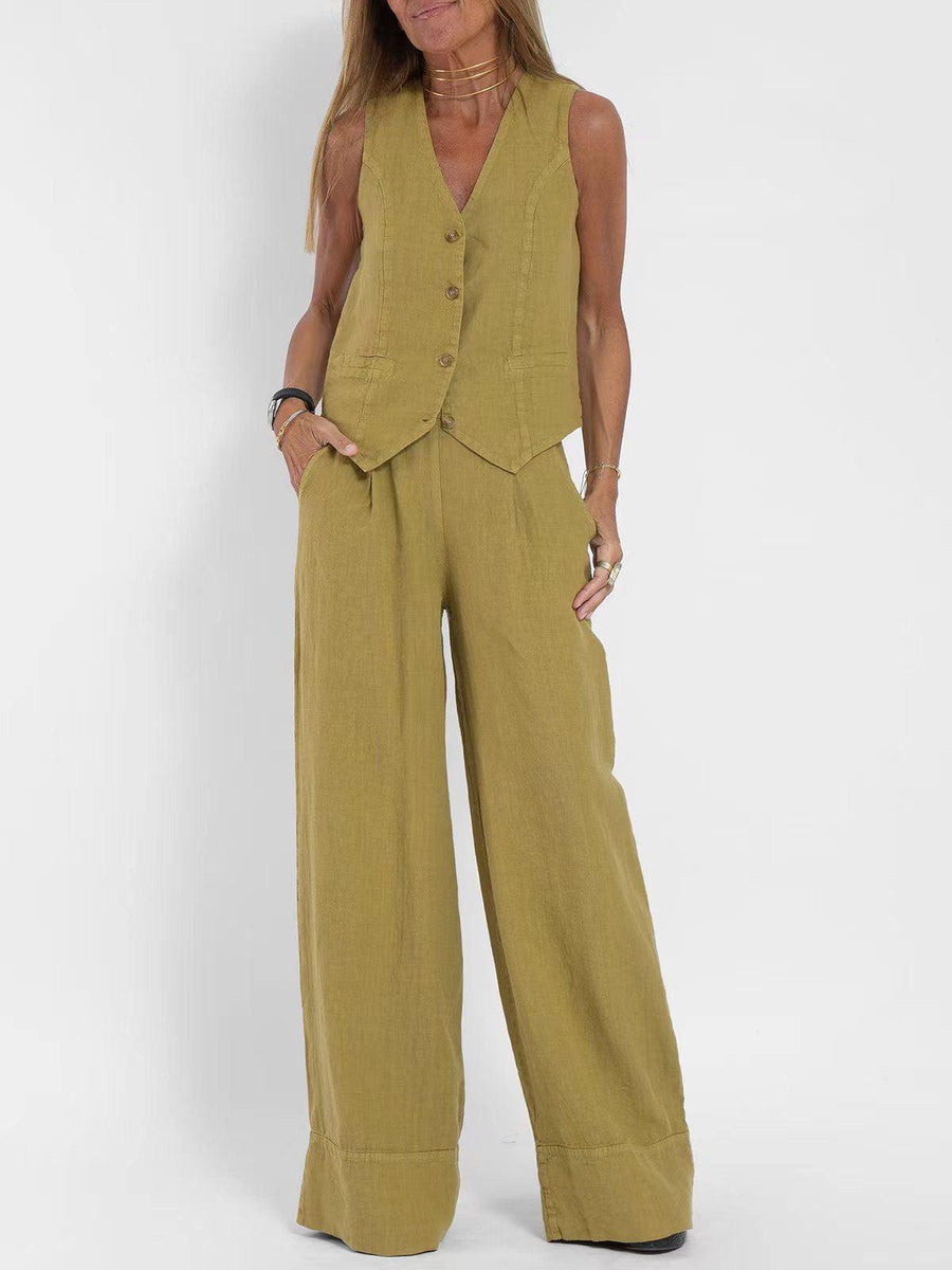 Olive linen-look waistcoat with buttons over matching wide-leg pants; V-neck, pockets, model with gold jewelry.
