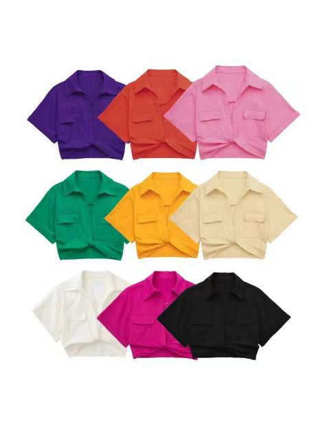 Nine cropped linen shirts with collars and chest pockets, arranged in three rows of assorted colors.