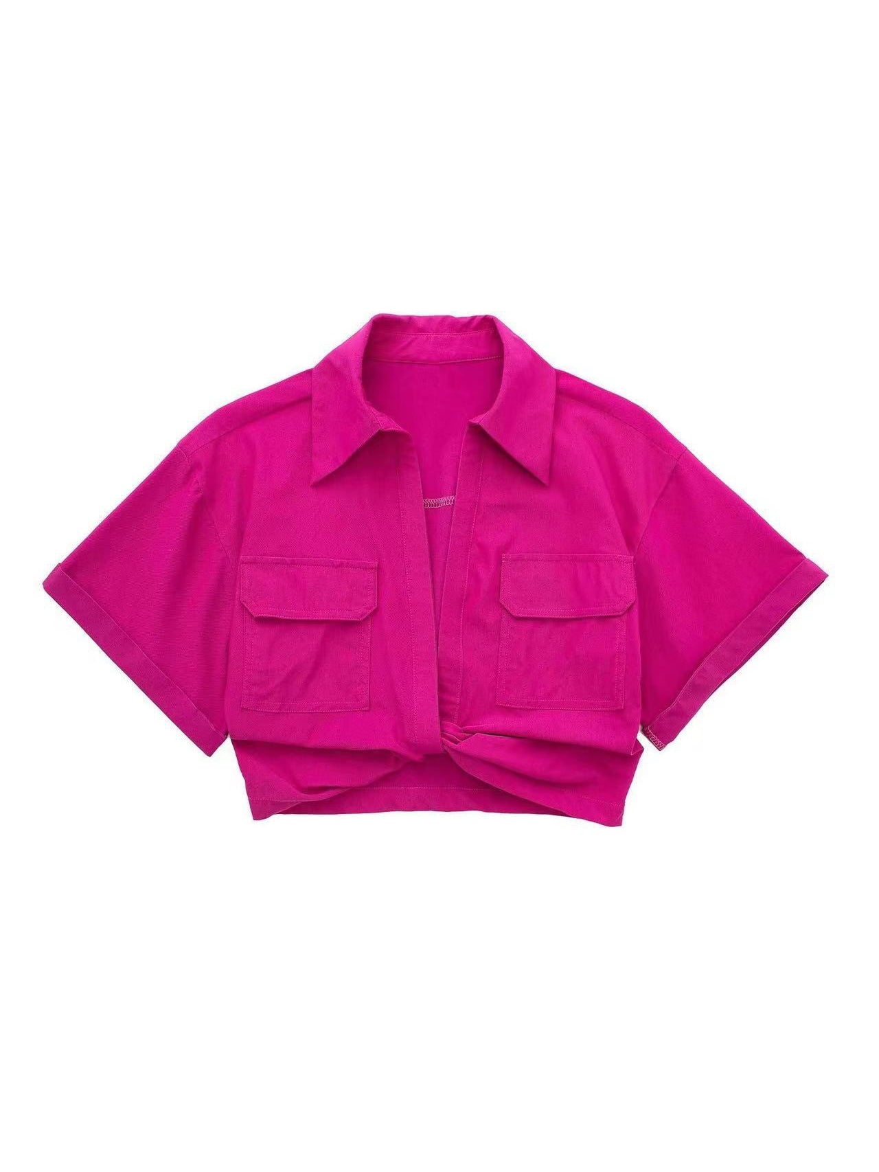 Vibrant pink linen crop shirt with a collar, short sleeves, two chest pockets with flaps, and a front knot at hem.