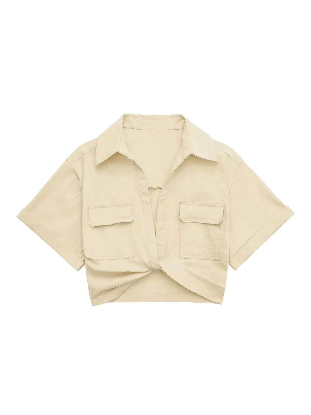 Beige linen knotted crop shirt with wide collar, two front flap pockets, short sleeves, tied at front.