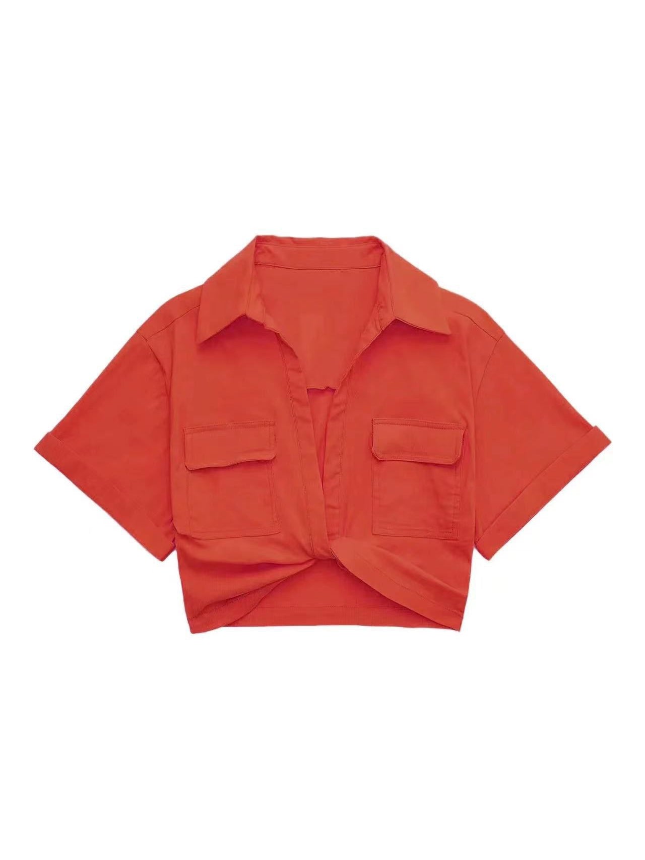 Coral linen crop shirt with a front knot, short sleeves, and two chest pockets.