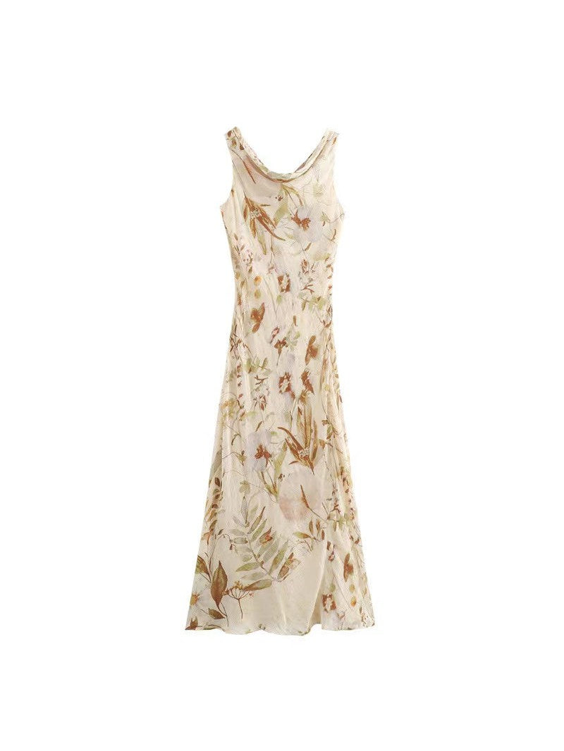 Beige botanical-print maxi dress with a draped cowl neck, thin straps, fitted bodice and flowing flare.