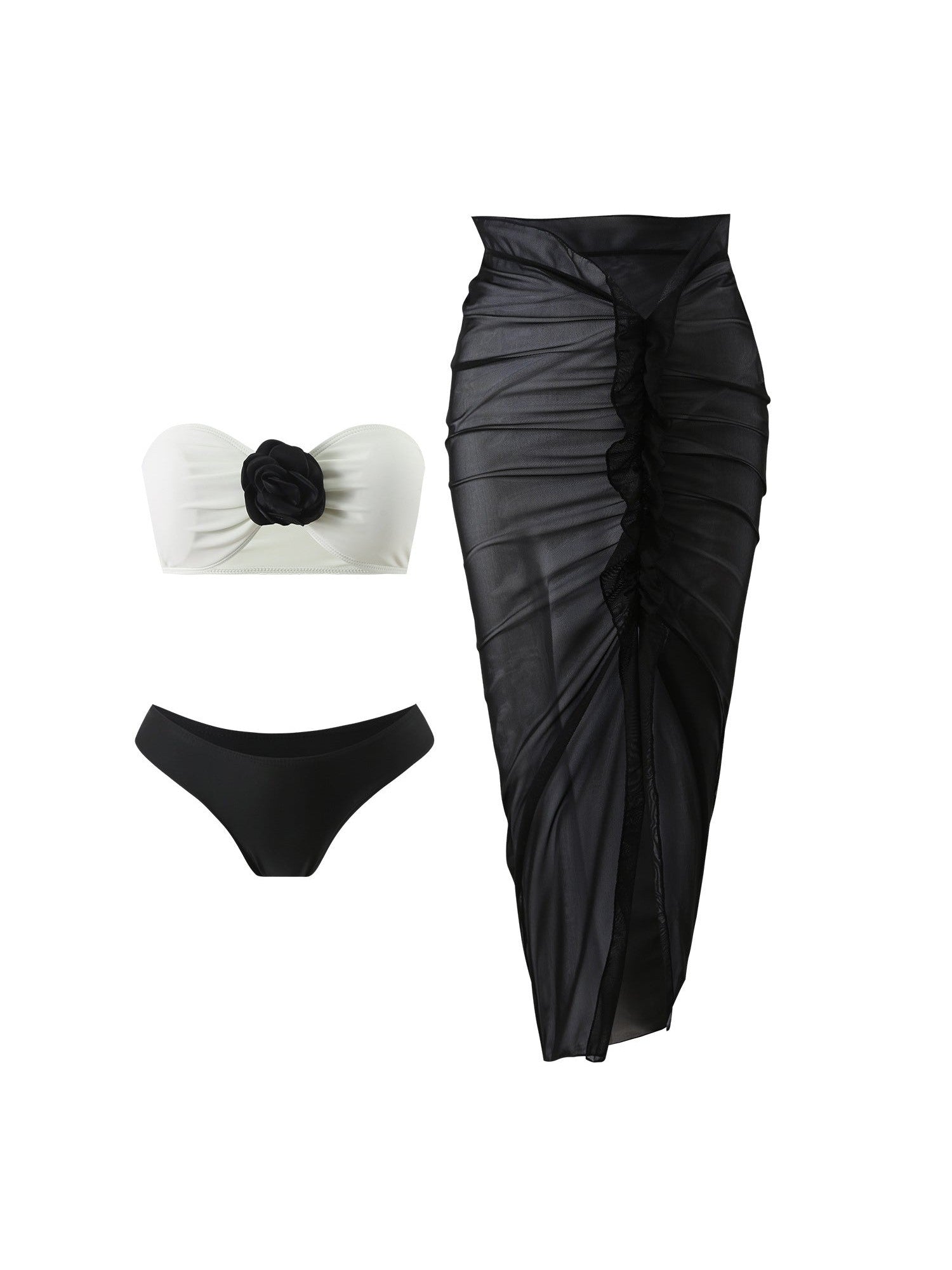 White strapless bandeau bikini top with a black rose applique, black bikini bottom, and a sheer black ruched mesh skirt.