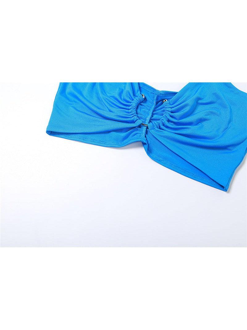 Bright blue bandeau-style crop top with centered ruching and small metal ring accents.
