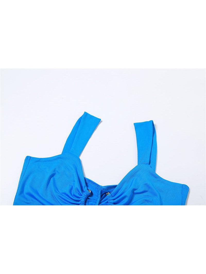 Bright blue cropped tank top with thick straps and center ruched detail with gold eyelets.