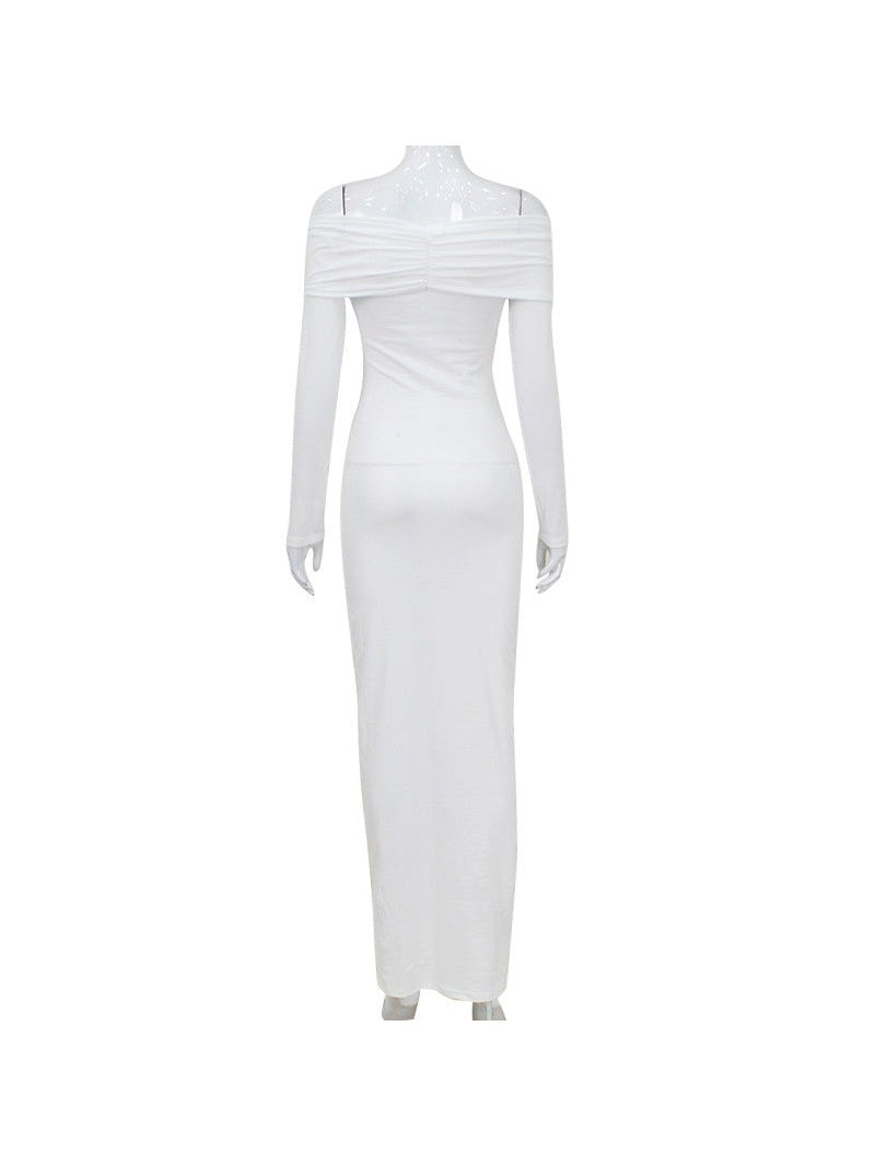 Back view of a white off-shoulder long-sleeve maxi dress with ruched bodice and fitted silhouette on a mannequin.
