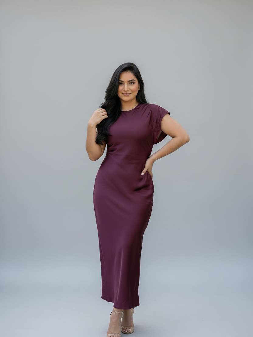 Burgundy satin midi dress on model; EXCLUSIVES brand, short sleeves, fitted silhouette.