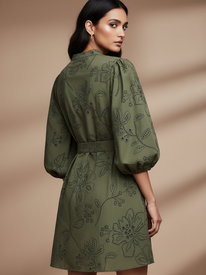 Green Short Cotton Dress with Belt featuring puff sleeves and eyelet embroidery.