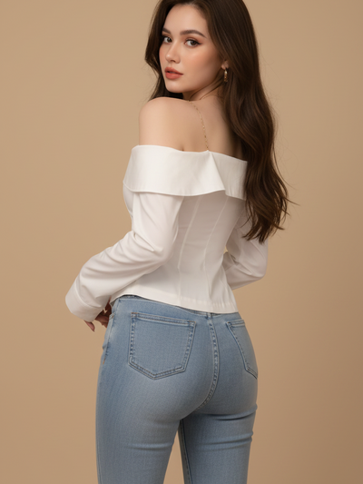 Off-Shoulder Asymmetric Lace-Up Shirt in white with a ruffled neckline, paired with light-blue jeans