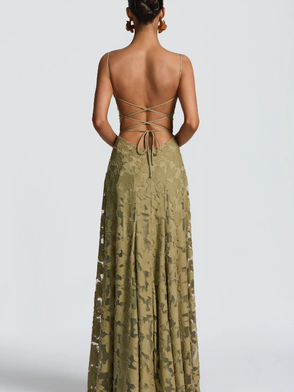 Back view of olive-green floral appliqué lace A-line maxi dress with spaghetti straps and lace-up crisscross back ties.
