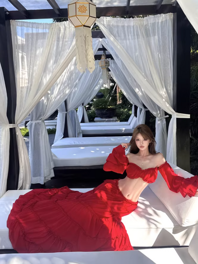 Scarlet Ruffle Off-Shoulder Tiered Maxi Set, red two-piece outfit on a model outdoors.