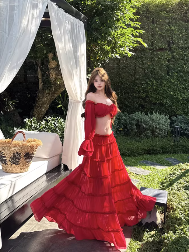 Scarlet Ruffle Off-Shoulder Tiered Maxi Set by Exclusives; red crop-top and tiered maxi skirt worn by a model outdoors.