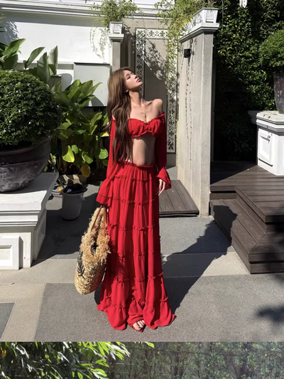 Scarlet Ruffle Off-Shoulder Tiered Maxi Set by Exclusives; red two-piece maxi outfit worn outdoors.