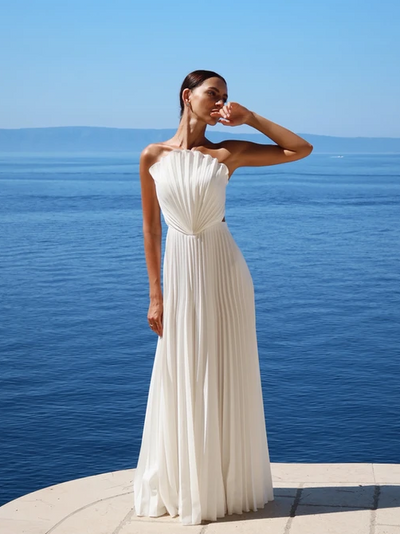 Exclusives white strapless backless pleated maxi gown with high slit