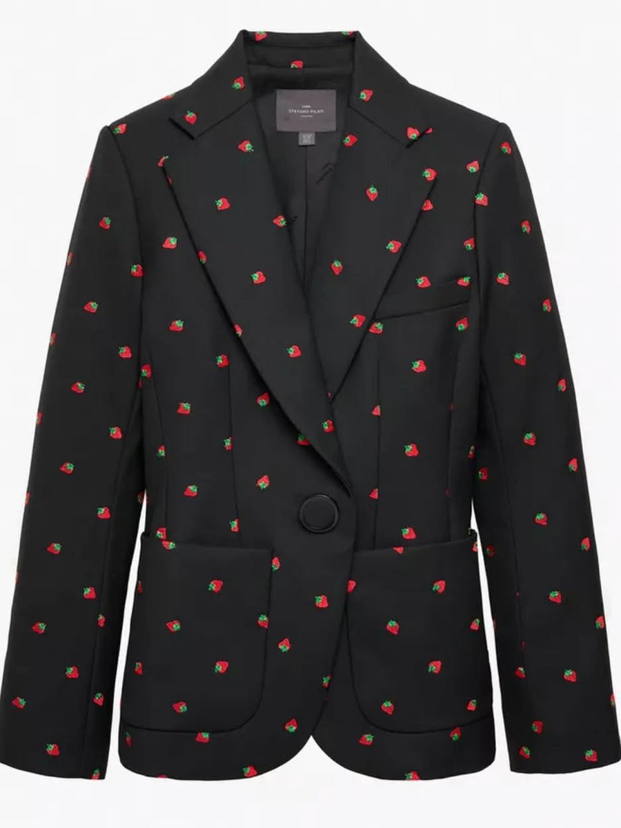 Black blazer with allover red strawberry print, notched lapels, single black button, two front patch pockets.