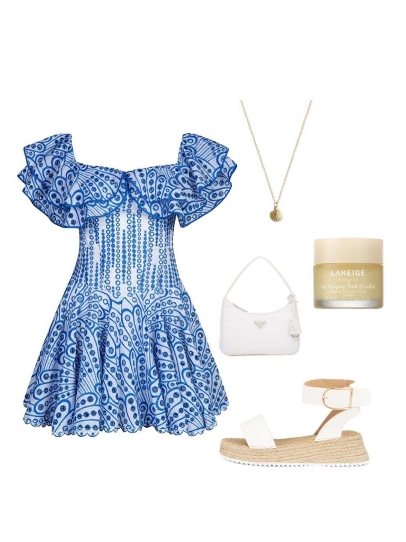 Blue and white off-shoulder embroidered mini dress with flutter sleeves.