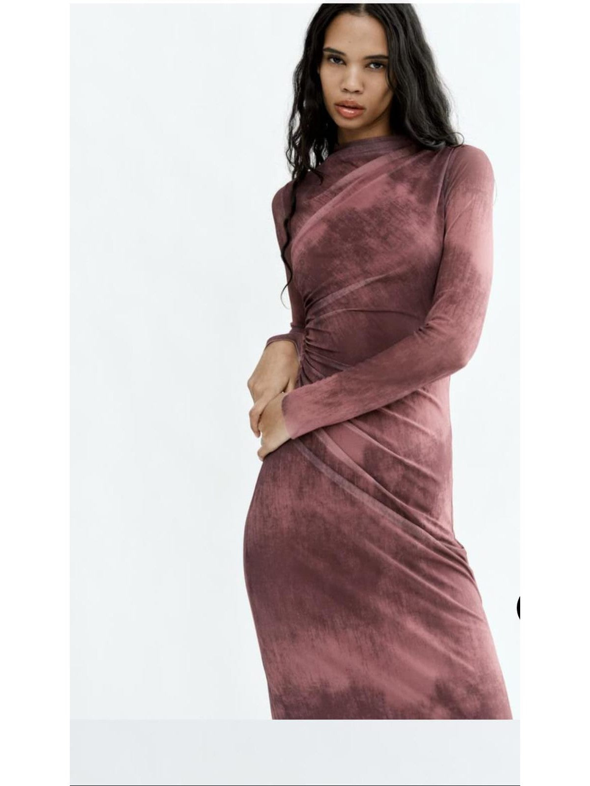 Model wearing dusty pink tie-dye high-neck mesh long-sleeve dress with ruched waist.