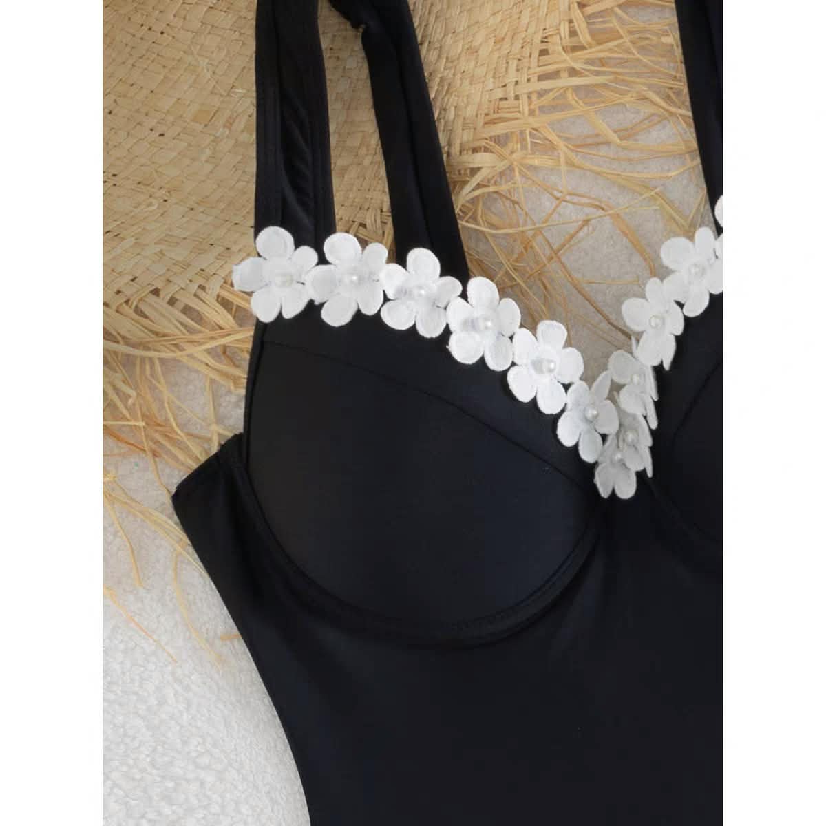Marbella Blossom Swimset, EXCLUSIVES black one-piece swimsuit with white flower appliqués along the bust, on sale