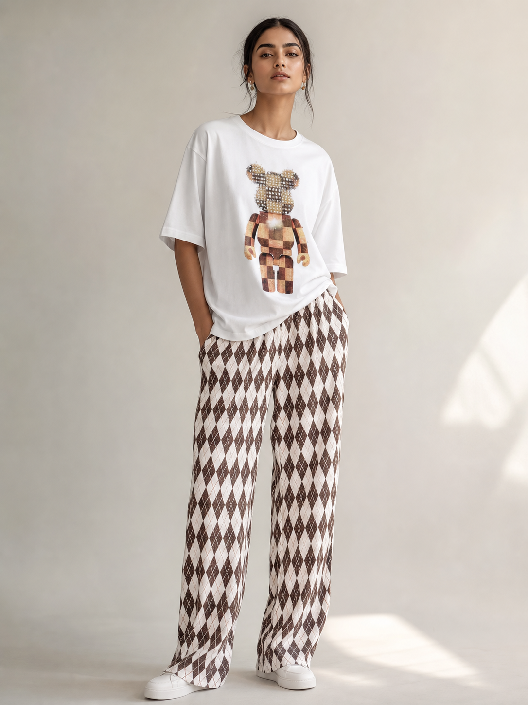 Two-piece combo set: white T-shirt with bear graphic and brown argyle wide-leg pants