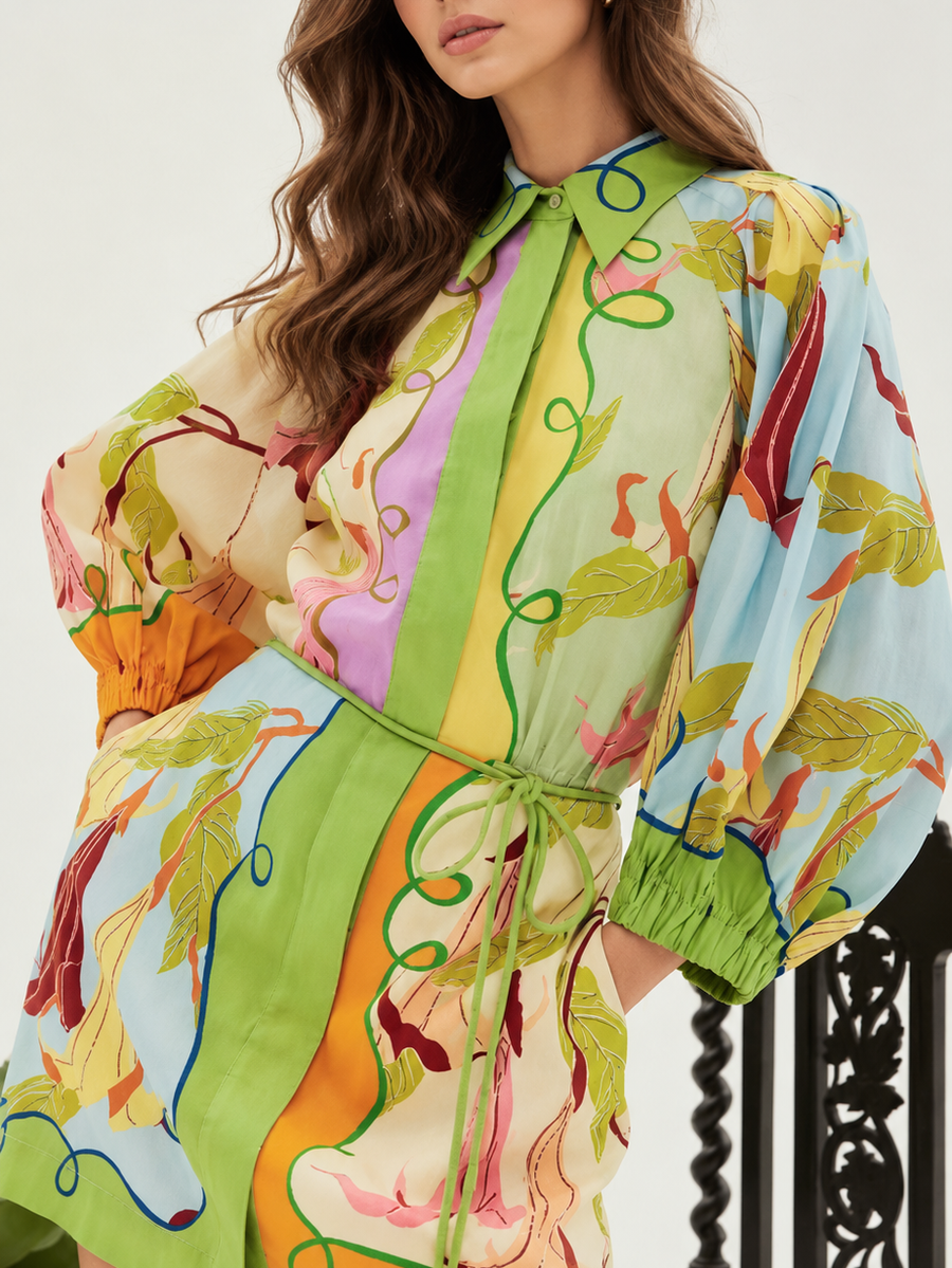 Tropical print balloon-sleeve shirt mini dress in bright multi-color palette with lime-green waist tie