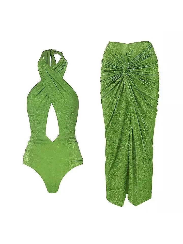 Bright lime green metallic halter-neck swimsuit with a front cutout, plus a matching ruched wrap skirt.