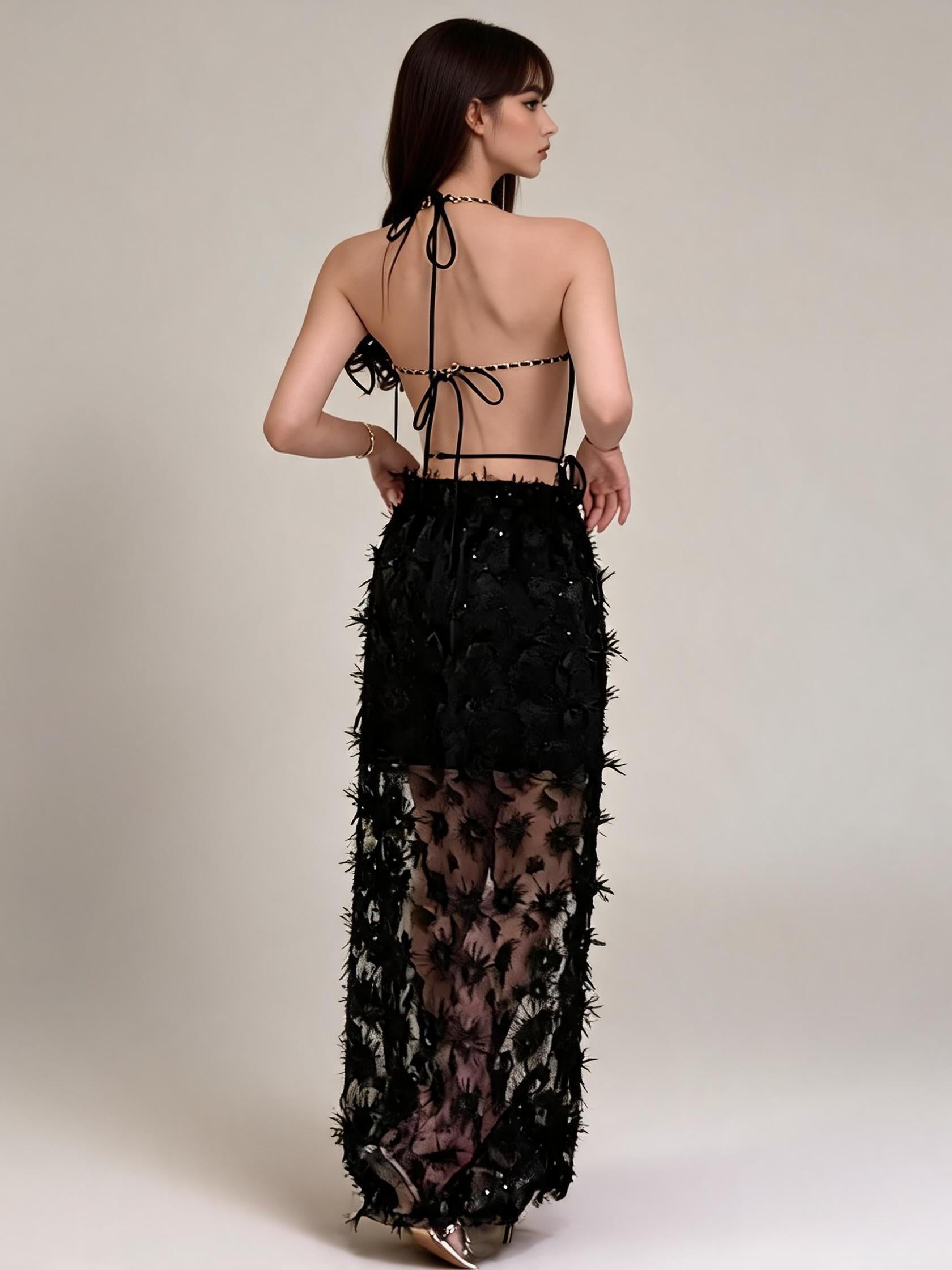 Noir Chain-Link Halter Monokini; black one-piece swimsuit with chain-link halter and back ties.