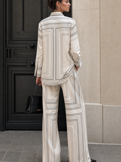 EXCLUSIVES Serene striped ivory grid co-ord set; cream top and wide-leg pants with black geometric grid lines.