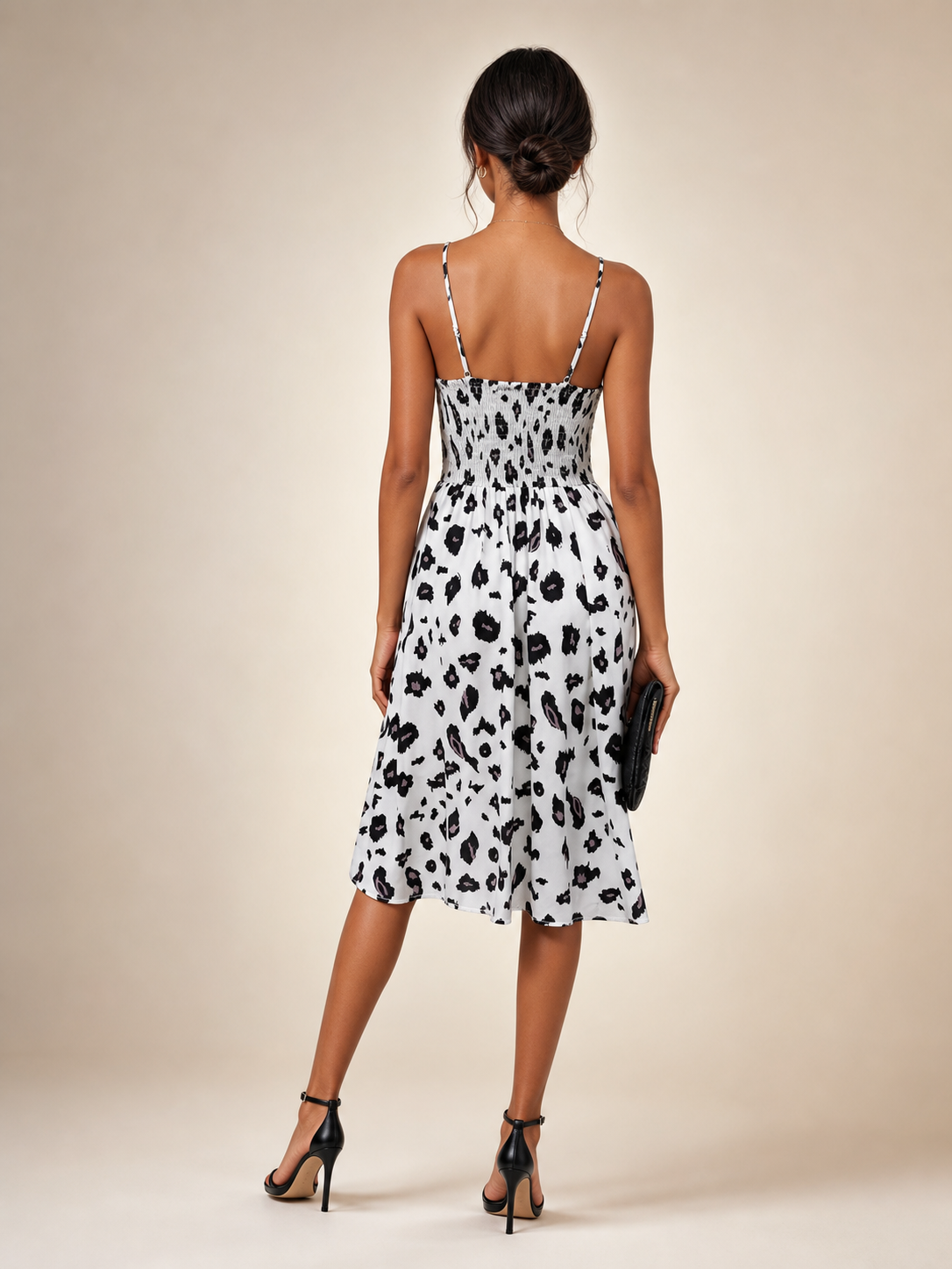 V-neck spaghetti-strap leopard print midi dress with smocked bodice in black and white