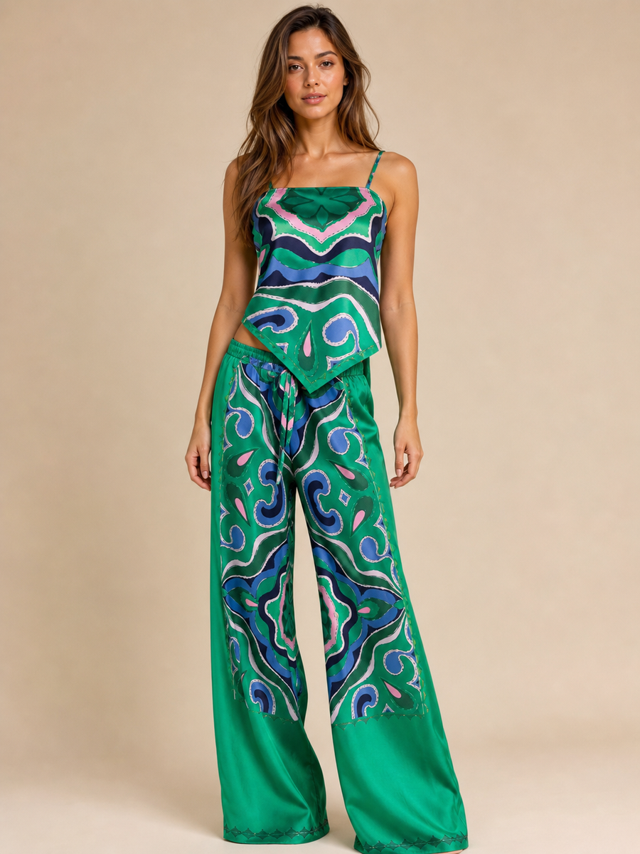 Strappy satin tube top and wide-leg pants coord set in green, blue, and pink abstract print