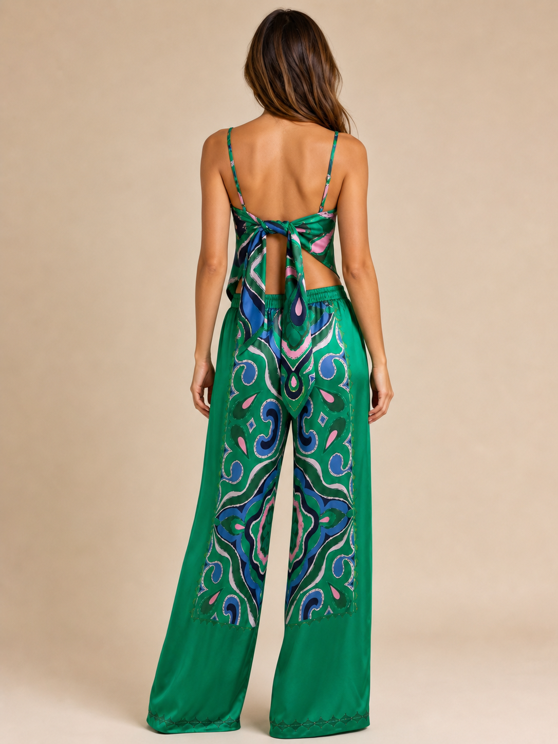 Strappy tube top and satin coord pants set by Exclusives in green with blue-pink abstract print.