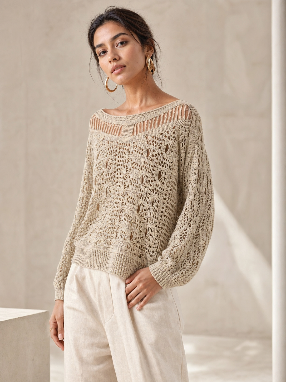 Hollow Out Knitted Sweater in beige with a loose-knit pattern and relaxed fit.