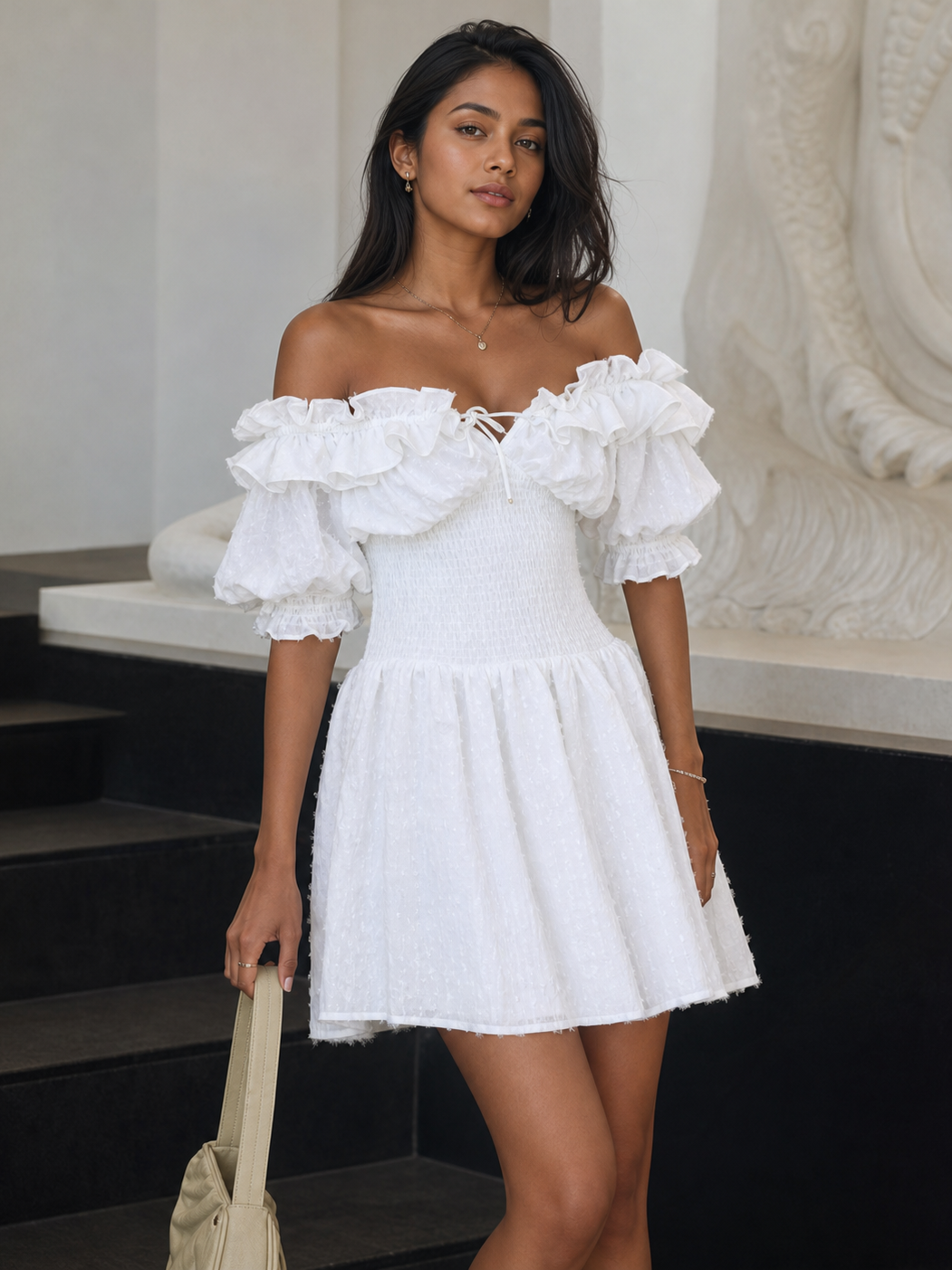 Ruffled off-shoulder white short dress with elastic waist and puff sleeves, shown on model.