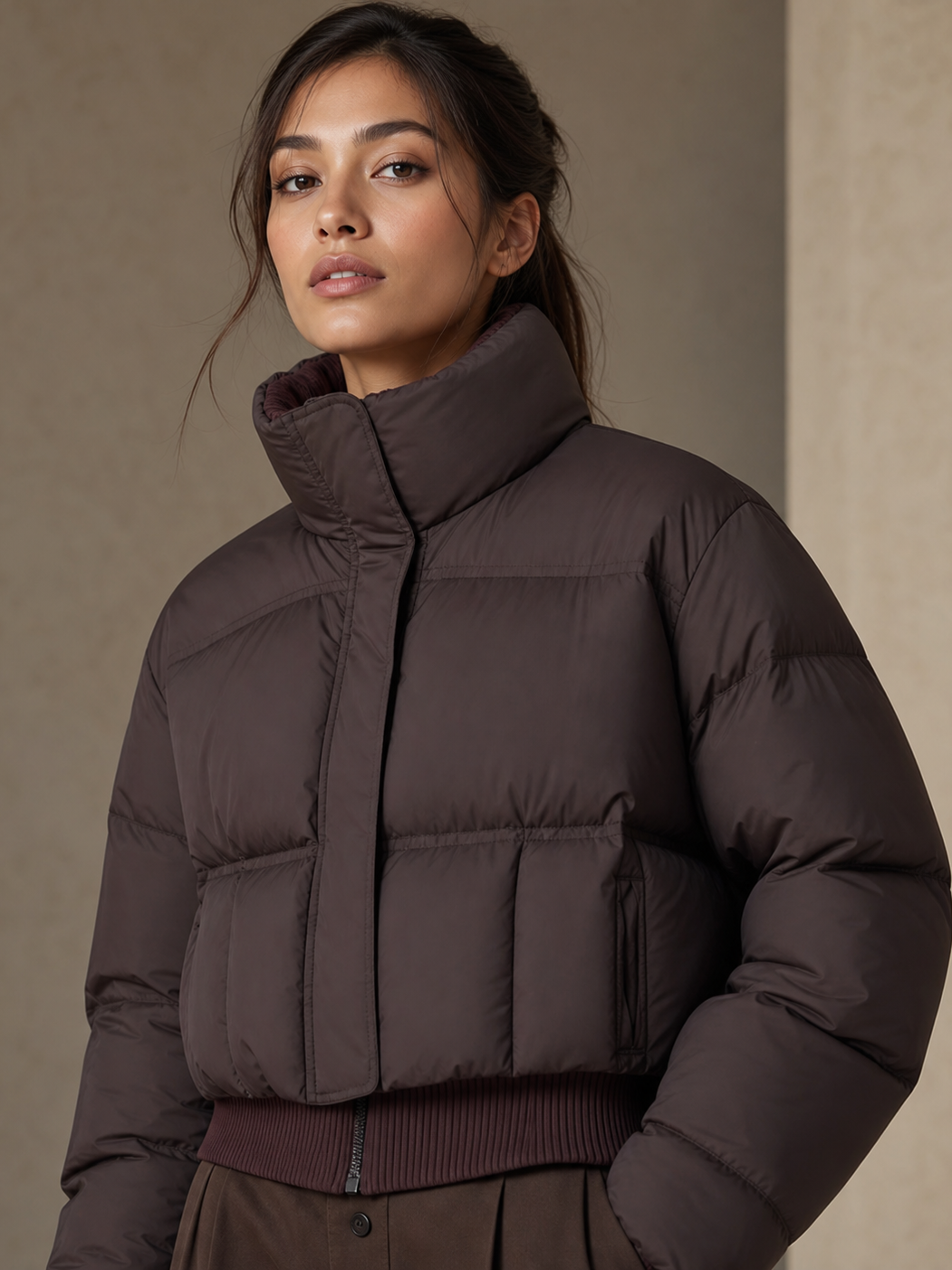 Ribbed bomber jacket in dark brown with a high stand collar and quilted panels