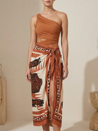 One-Shoulder Swimsuit & Tiger Sarong Skirt Set by Swimwears; terracotta top with tiger-print wrap skirt.