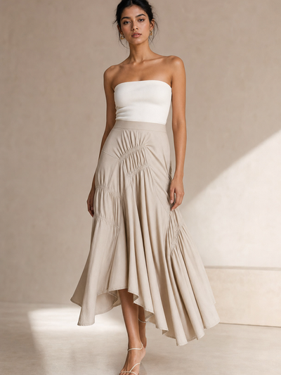 A Line Pleated Ruffle Ruched Skirt by EXCLUSIVES; beige high-low A-line skirt.
