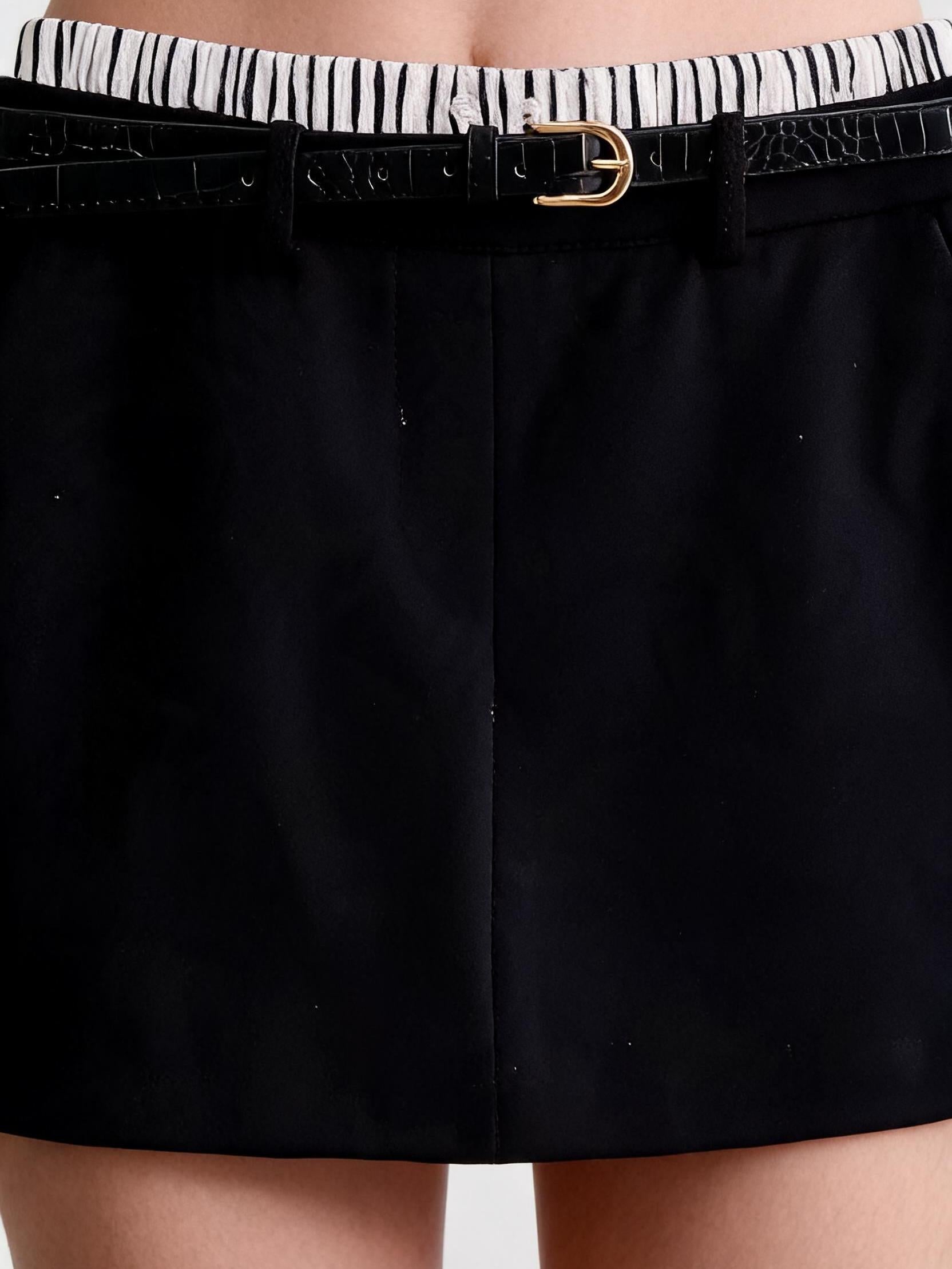 Black Skorts with Belt featuring a gold buckle and striped elastic waistband