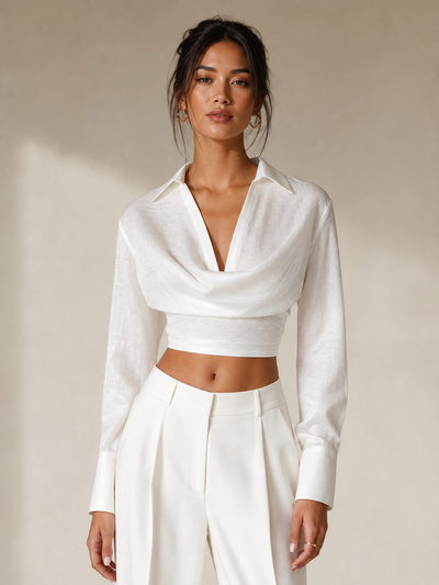 Full Sleeves Deep Neck Collared Crop Shirt Top in white with a draped front, modeled with white trousers by EXCLUSIVES